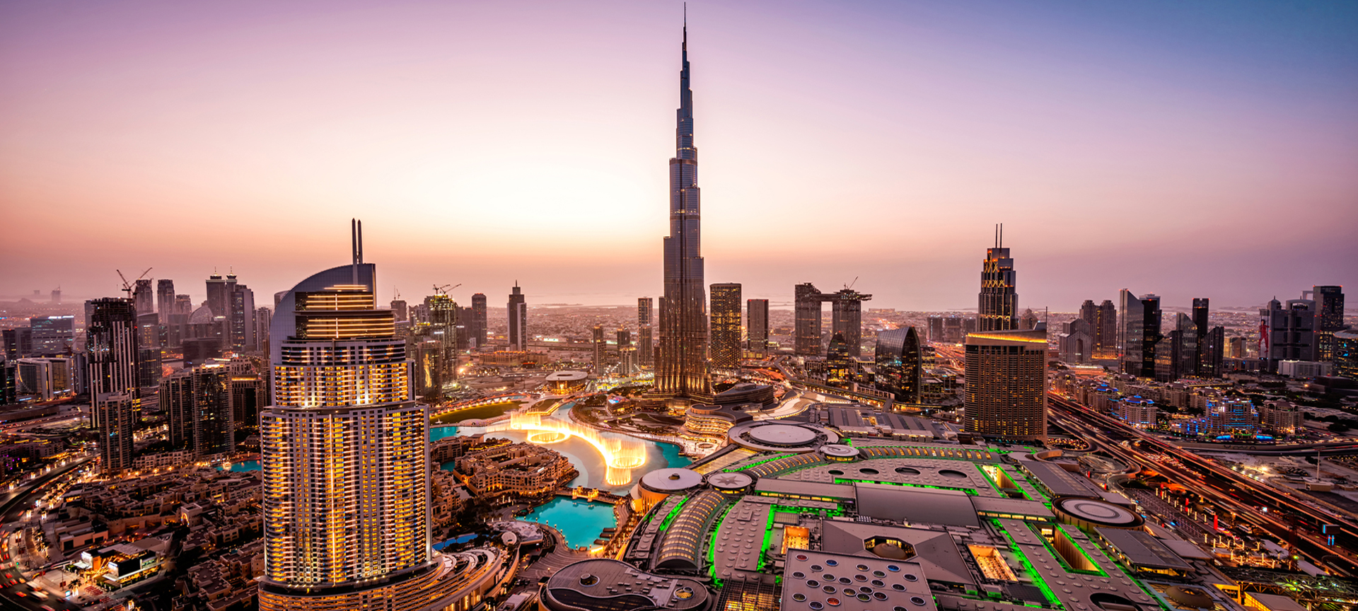 The modern skyline of Dubai featuring the Burj Khalifa, illustrating luxury Dubai city tours and desert safari experiences.