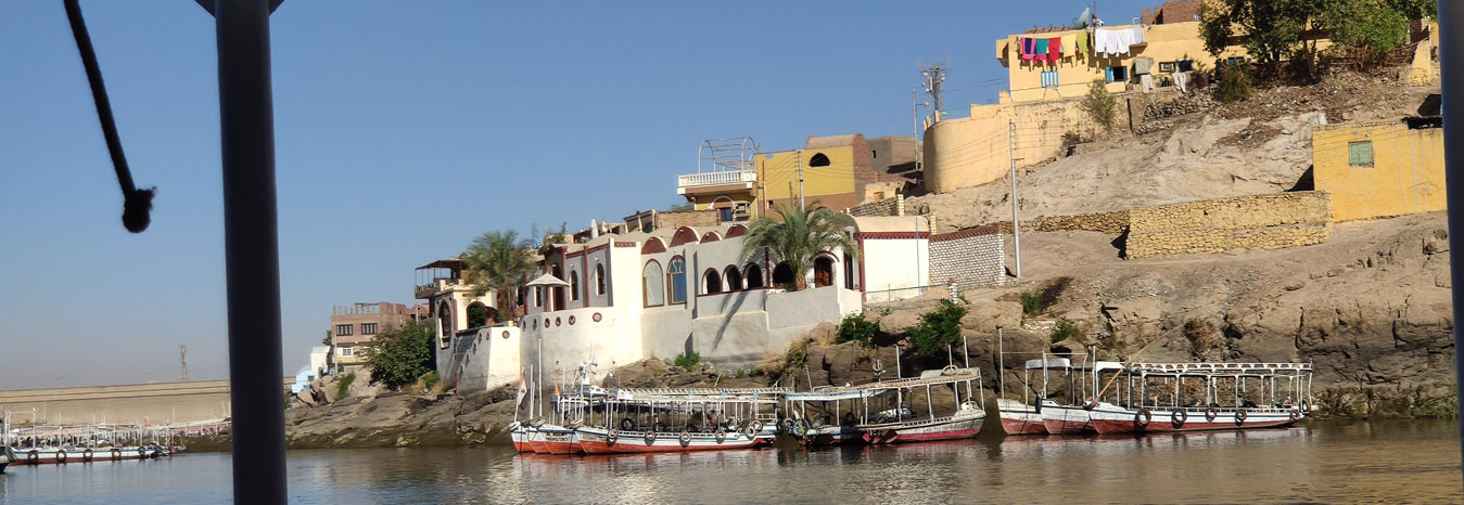 Colorful traditional Nubian house and village architecture in Aswan, Egypt.