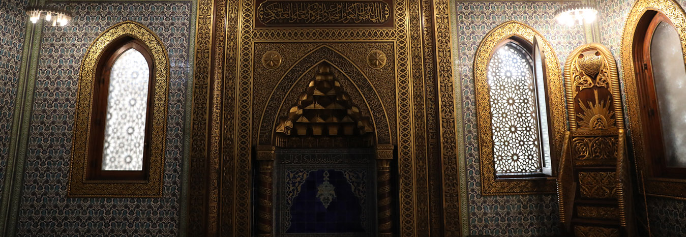 Ornate golden ceilings and intricate tile work inside the Mohamed Ali Palace in Manial, Cairo.