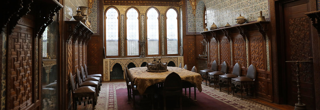 Ornate Ottoman-style architecture and decorative wood carvings in the Prince Mohamed Ali Palace, Cairo.