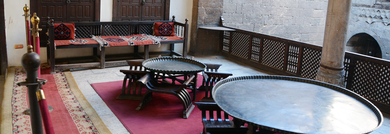 Ornate domestic architecture and historic artifacts inside the Gayer-Anderson Museum in Cairo.