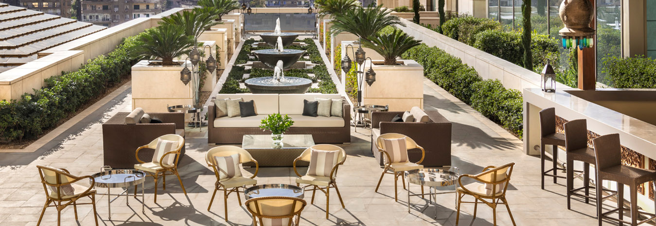 Modern and grand architectural design of the St. Regis Cairo Hotel, featuring premium marble and Pharaonic-inspired decor.