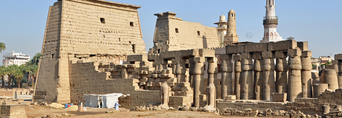 Night view of the illuminated Luxor Temple and its ancient Egyptian columns