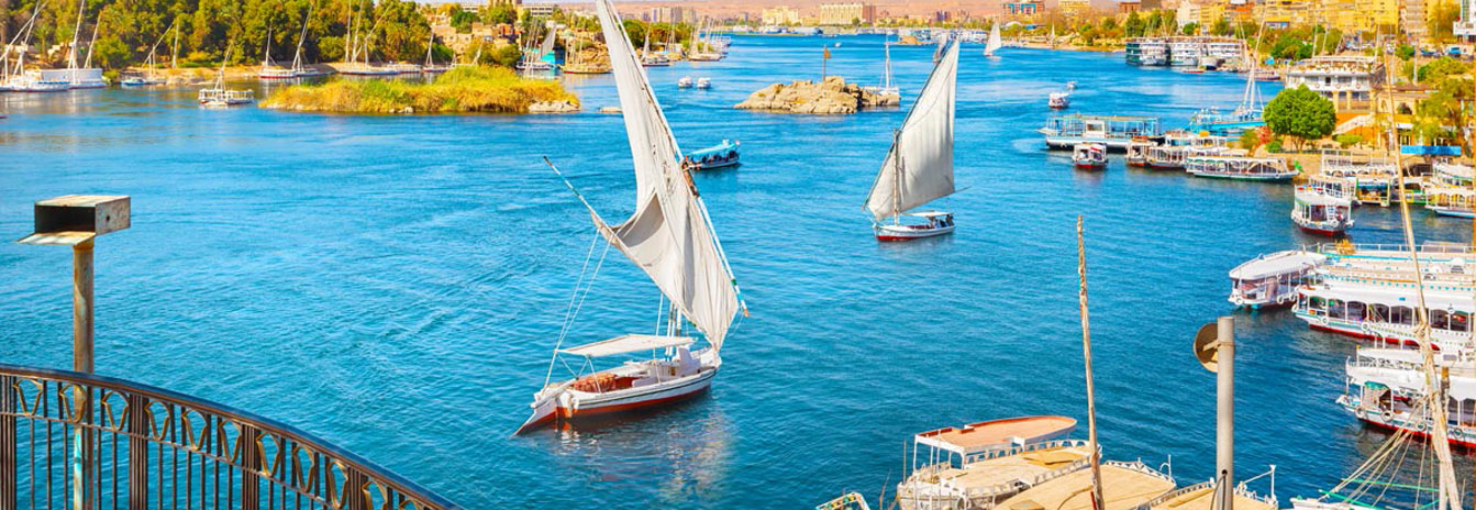 Panoramic view of the Nile River at sunset in Aswan, Egypt - Avatar Travel