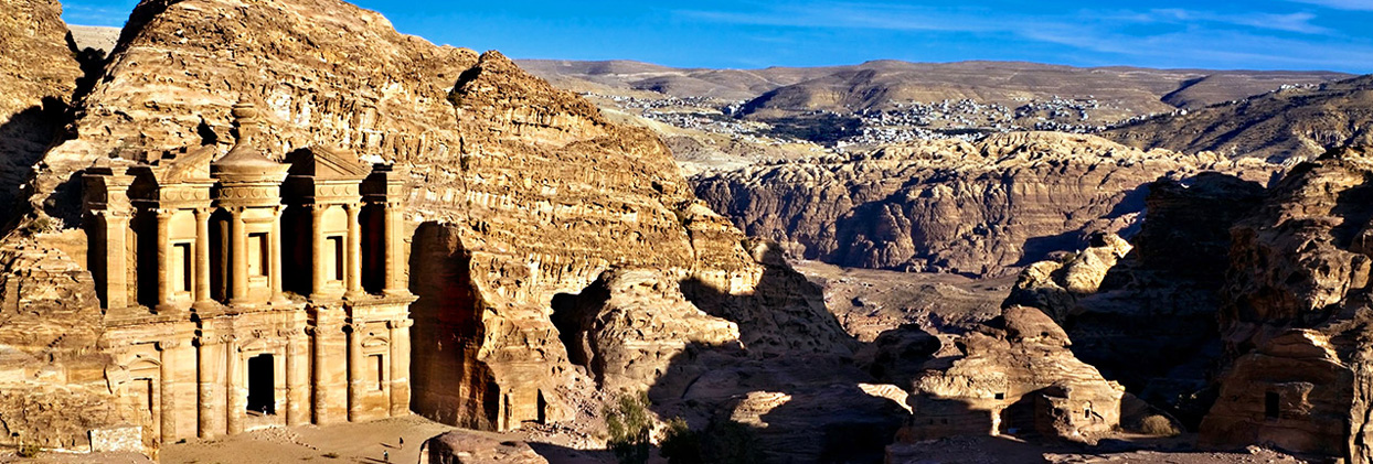 The iconic Al-Khazneh Treasury carved into the red sandstone cliffs of Petra