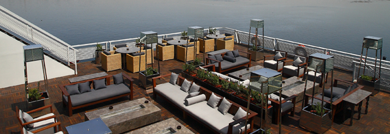 The 5-star Mövenpick MS Darakum cruise ship docked in Cairo with a view of the Nile.