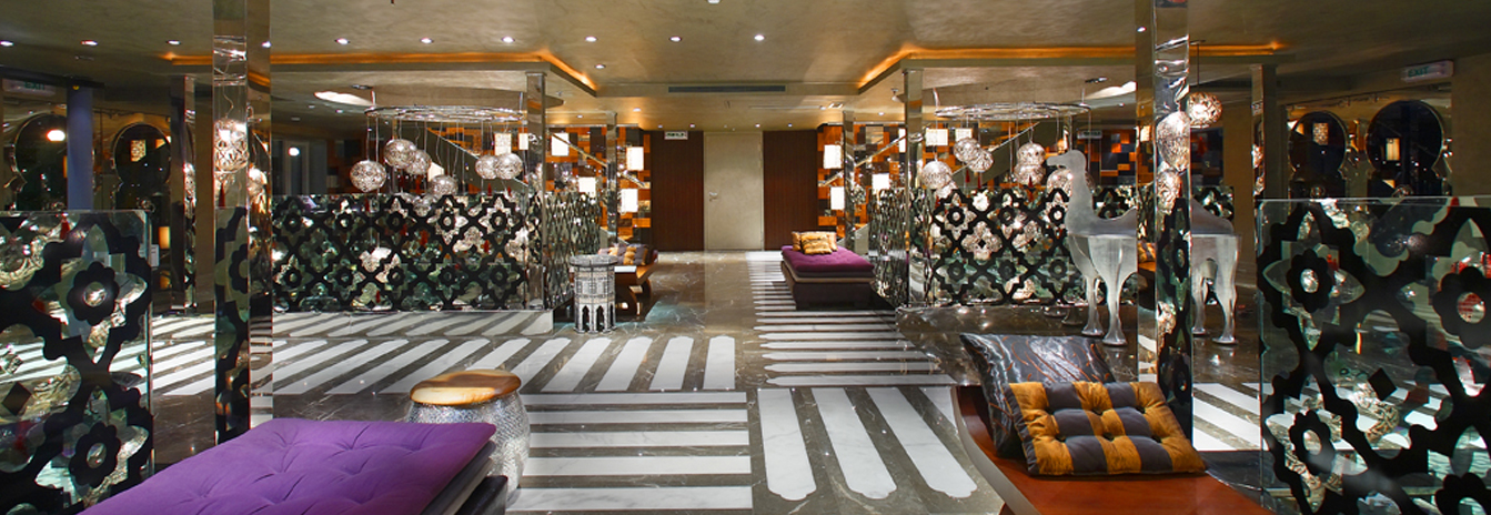 Luxurious Moroccan-themed lounge on the Movenpick MS Darakum with ornate mosaic pillars and designer lighting.