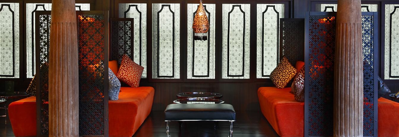 The ornate main lounge of the MS Darakum featuring Moroccan arches and luxury seating.