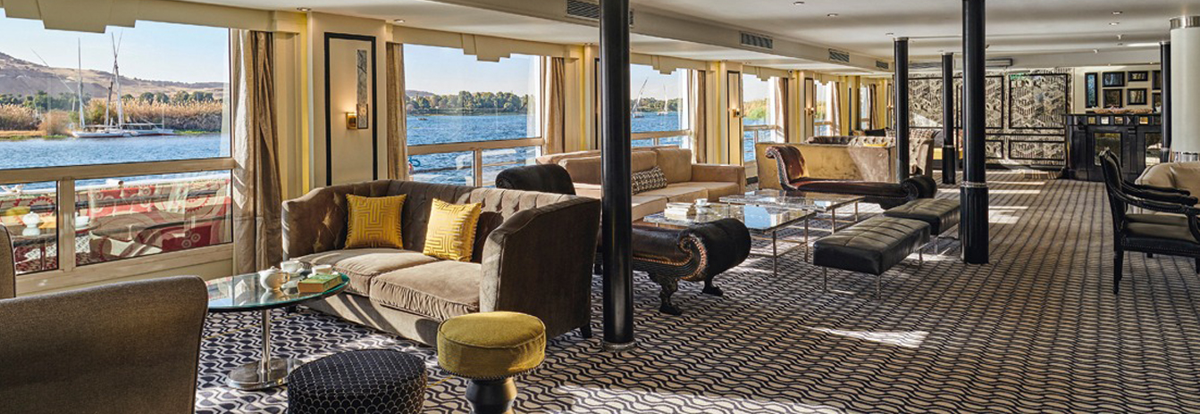 The 5-star Mövenpick MS Hamees cruise ship sailing on the Nile River near Luxor.