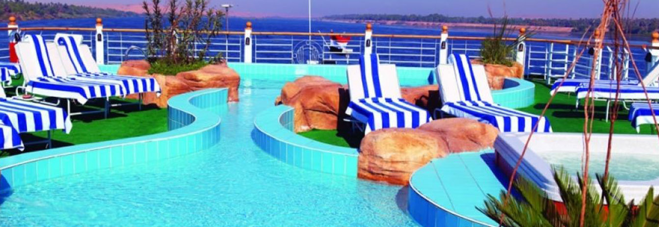 The expansive sun deck of a Mövenpick cruise ship featuring a swimming pool and shaded lounge area.