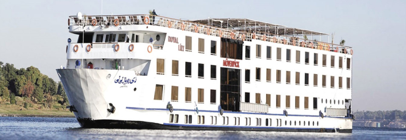 The 5-star Mövenpick Nile Cruise ship sailing the Nile River near Luxor, Egypt.
