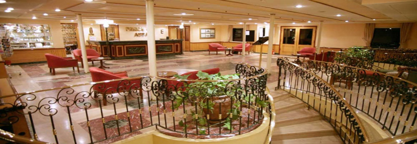 The modern and elegant lobby of a Mövenpick Nile Cruise ship with contemporary Egyptian decor.