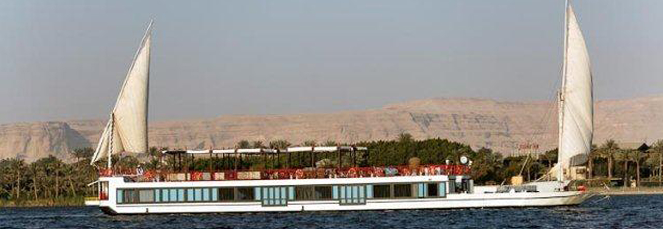 The luxury Mövenpick SB Feddya boutique cruise ship with traditional sails on the Nile.