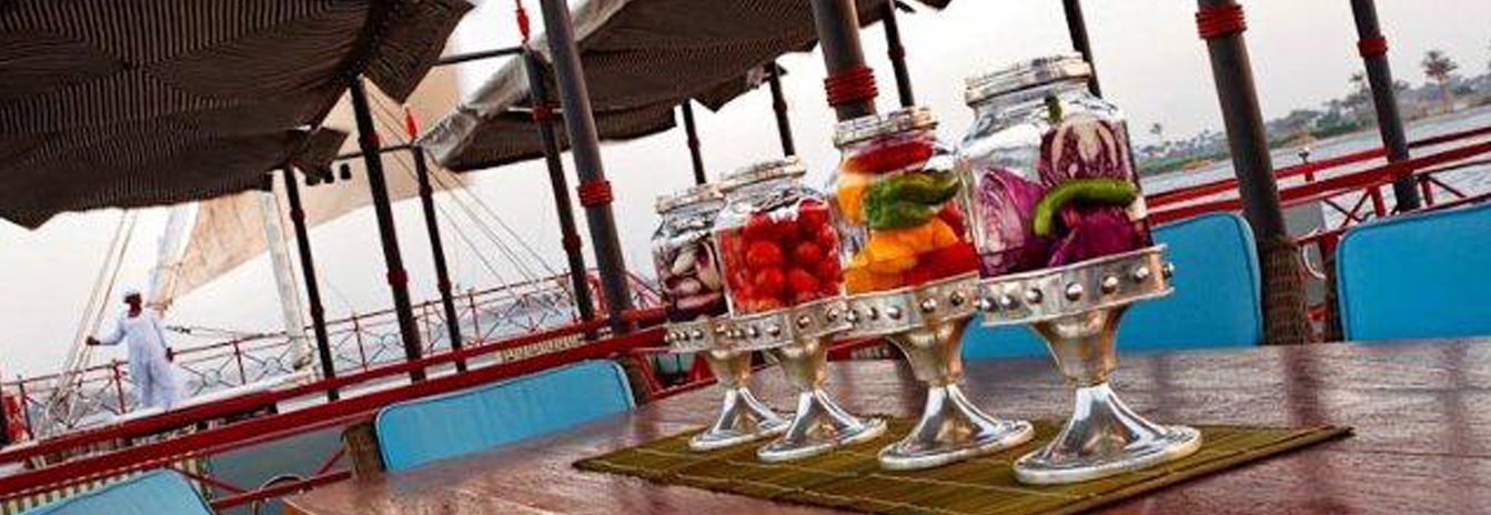 The sun deck of the Mövenpick SB Feddya with comfortable lounge seating and a private Jacuzzi.