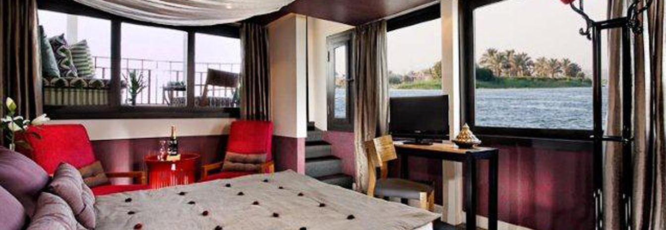 One of the four contemporarily designed suites on the Mövenpick SB Feddya featuring a private balcony.