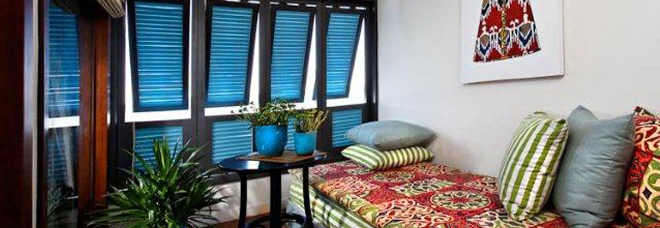 One of the four contemporarily designed suites on the Mövenpick SB Feddya featuring a private balcony.