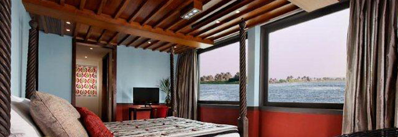 One of the four contemporarily designed suites on the Mövenpick SB Feddya featuring a private balcony.
