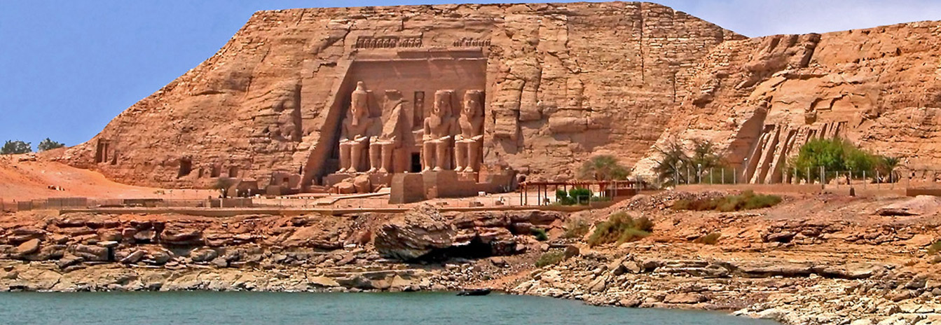 The Great Sun Temple of Abu Simbel featuring four colossal statues of Ramses II - Avatar Travel