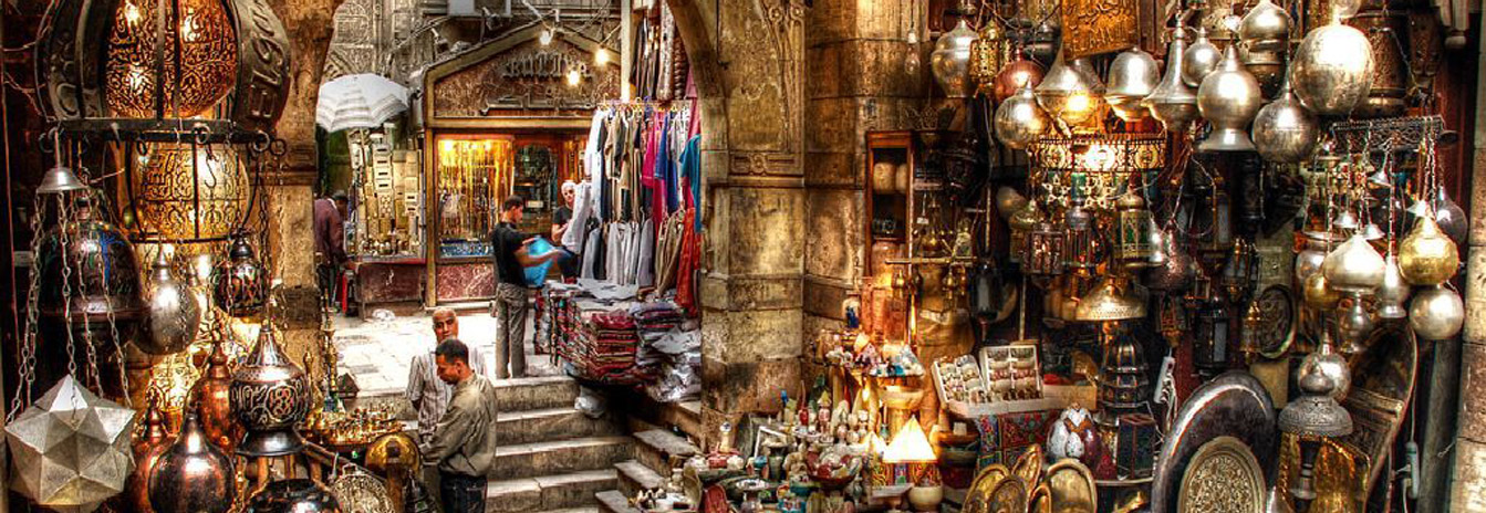 Vibrant stalls and narrow alleyways of the historic Khan el-Khalili bazaar in Islamic Cairo.